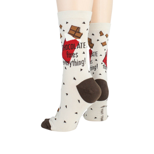 Close-up shot highlighting the sock's design details, including the chocolate bar graphics and text.