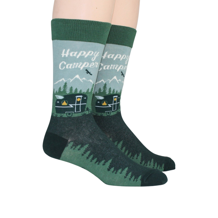 Lifestyle shot of two Happy Camper socks on a person's feet.