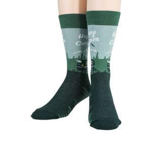 Flatlay image showing two Happy Camper socks laid flat.