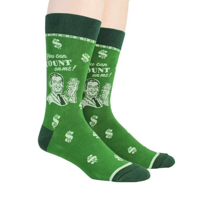 Lifestyle shot of a person wearing a pair of green 'Accountant' socks.
