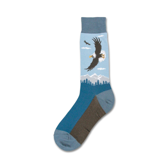 Single blue crew sock showcasing a detailed image of a bald eagle in flight over mountains.