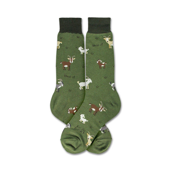 Close-up view of a pair of green crew socks with a goat design, showcasing the 'Bleat it!' text and details of the goat illustrations.