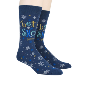 Lifestyle shot showing 'Let It Snow' socks on a person's feet.