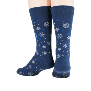 A pair of blue socks with a pattern of snowflakes.