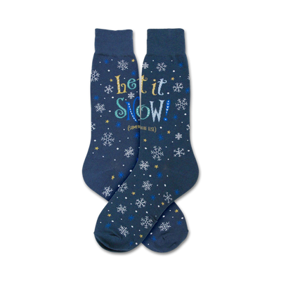Pair of navy blue crew socks with a snowflake and 'Let It Snow' design in blue, white, and gold text.