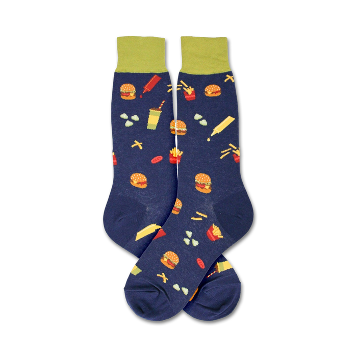 Flatlay image showing a pair of navy blue 'Burger' socks with lime green cuffs.