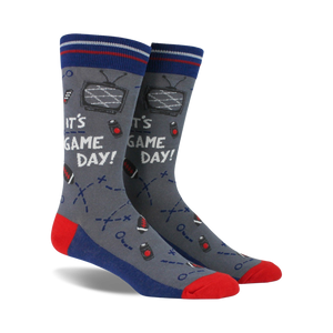 Flat lay product shot of the socks, emphasizing the detail and color of the design and the comfortable ribbed cuff.
