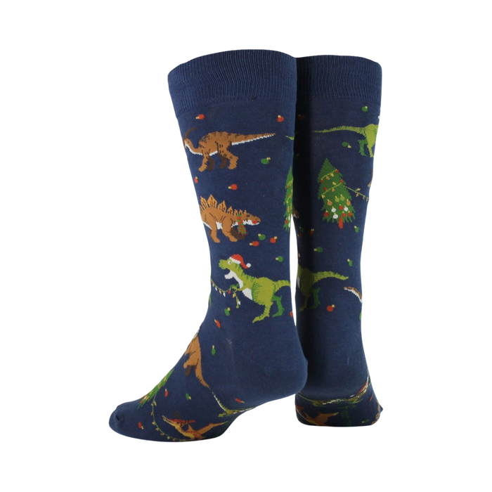 Back view of navy blue crew socks with a Christmas dinosaur pattern.