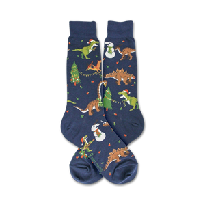 Flat lay showcasing the full design of the navy blue crew socks; Christmas dinosaurs and snowmen.