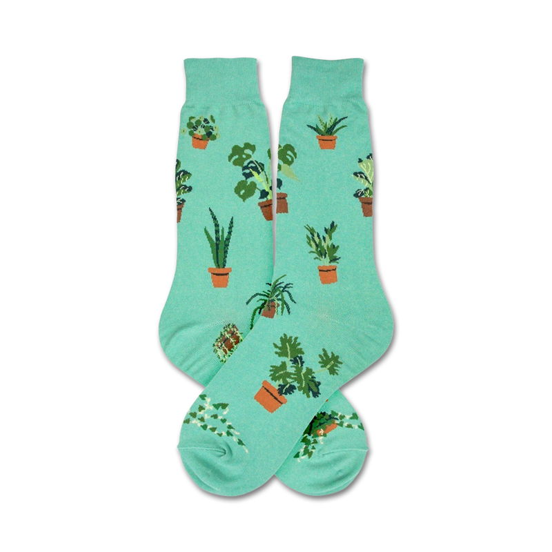 Pair of teal crew socks with illustrated potted plants. Fun, quirky design for plant lovers.