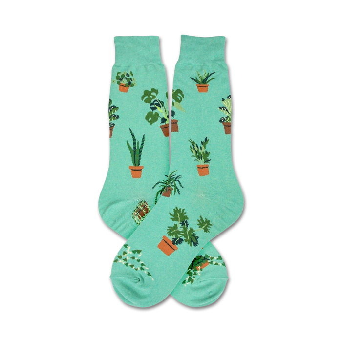 crew socks in light green feature various potted plants in different colored pots.   