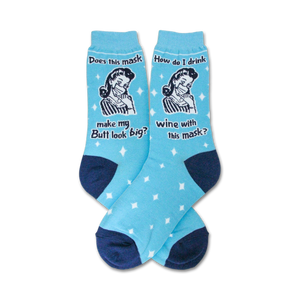 Pair of light blue crew socks with a retro woman design and text that says,