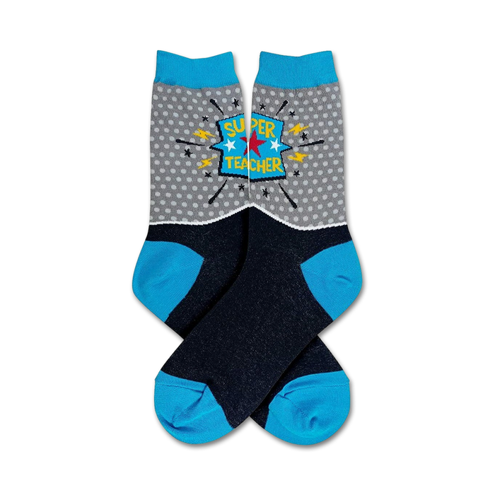 Pair of crew socks in grey with blue accents. The socks feature a comic-style 'Super Teacher' graphic with a star and lightning bolts. }}