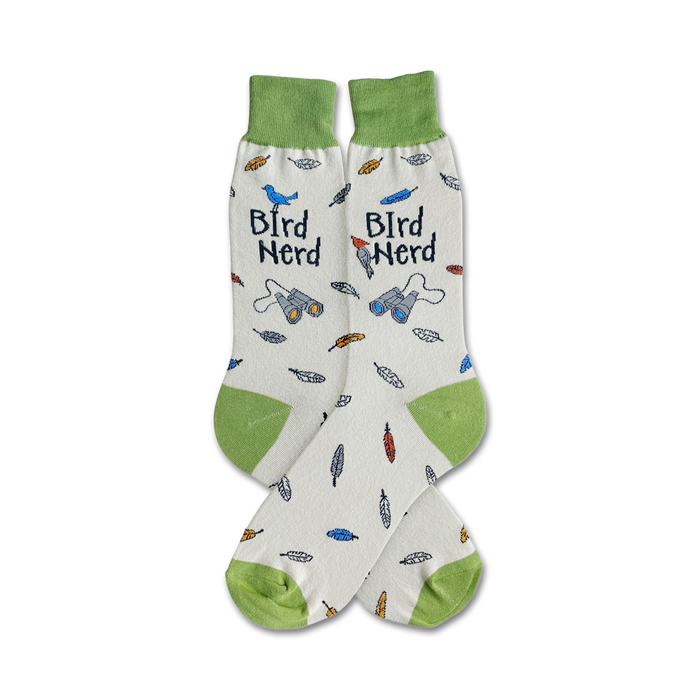 crew socks with feathers and binoculars for men in white with green heel and cuff.   }}