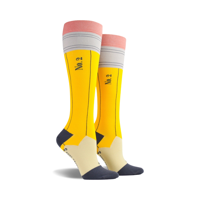 Pair of yellow knee-high socks with a pencil design. Features a pink eraser, gray base, and 'No.2' printed on the shaft. }}