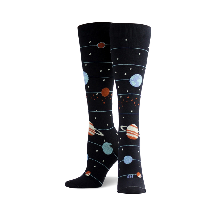 planet-patterned knee-high socks for men and women featuring earth, saturn, jupiter, mars, moons, and stars.    }}