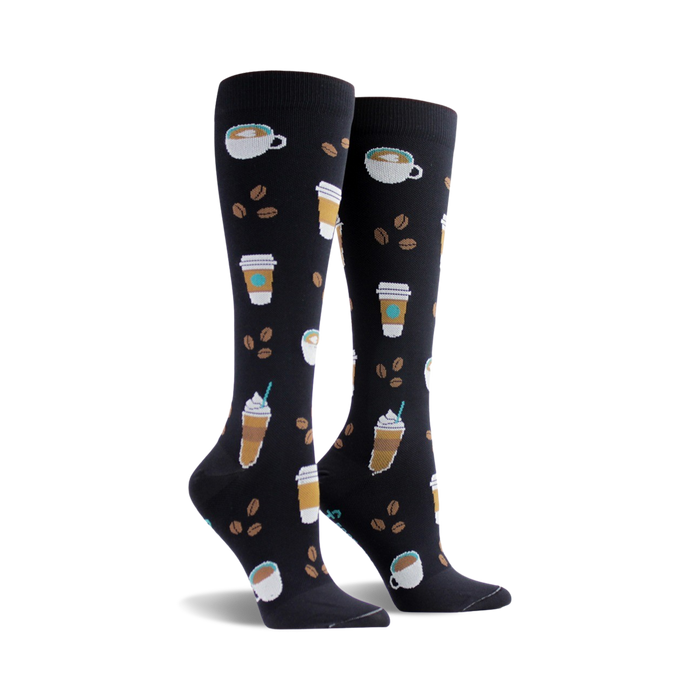 Pair of black knee-high socks adorned with illustrations of coffee cups, coffee beans, and frothy drinks. A fun and cozy design! }}