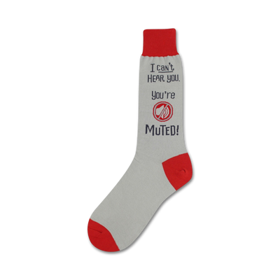 Grey crew socks with red cuffs.  The socks feature a navy graphic that says "I can't hear you, you're muted!"