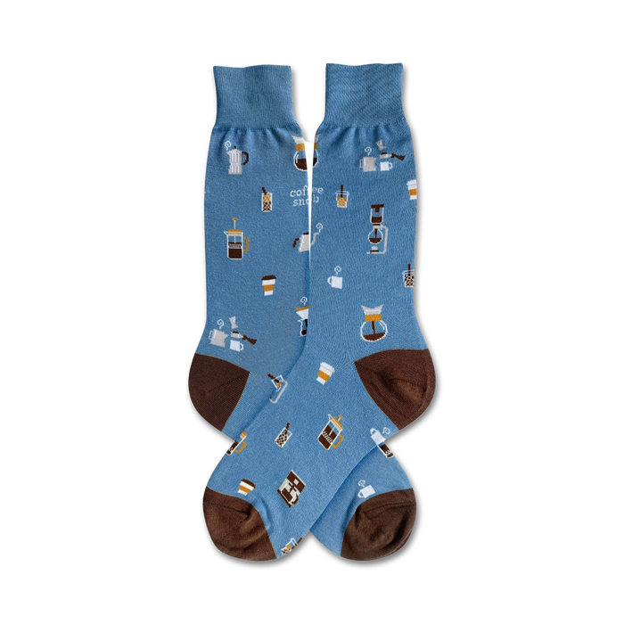 Pair of light blue crew socks with brown cuffs. The socks are adorned with a pattern of coffee cups, pots, and other coffee-related items. }}