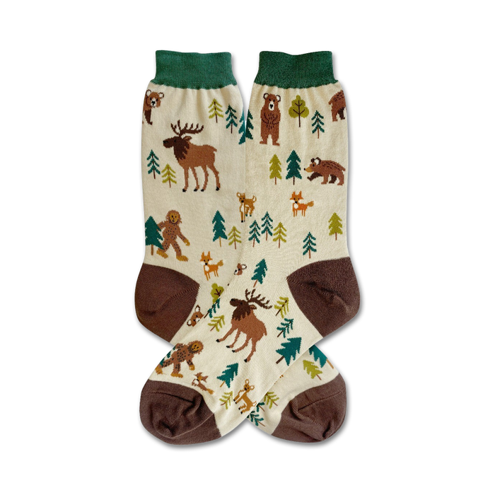 woodlands creatures socks in cream, brown, and green with adorable forest animals and bigfoot design.   }}