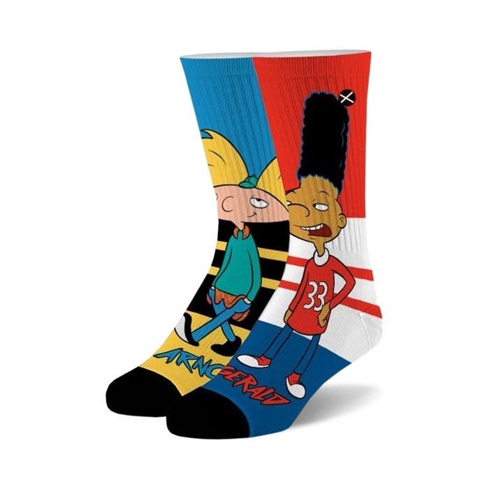 A pair of crew socks showcasing Arnold and Gerald from Hey Arnold!  The socks are mainly blue, red, yellow, and white with cartoon character graphics. }}