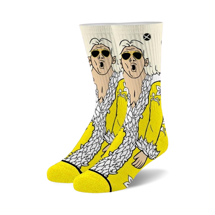 Pair of crew socks showcasing a comical illustration of a person in a yellow robe and sunglasses. The background is mostly yellow and white. }}