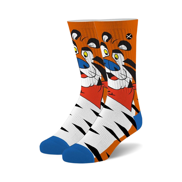 Pair of crew socks featuring Tony the Tiger.  The socks are white with orange tiger stripes and a large image of Tony on the top in orange, red, and blue. }}
