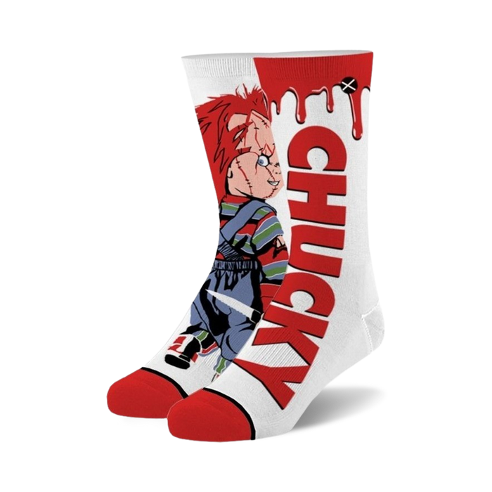 A pair of Chucky crew socks. They're white with a large red 'CHUCKY' graphic and an image of Chucky holding a knife. }}