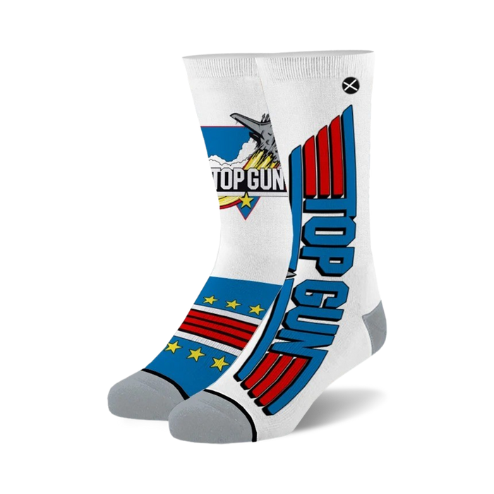 Pair of white crew socks with Top Gun logo and design elements in red, white, and blue. Features a jet plane image and the movie title. }}