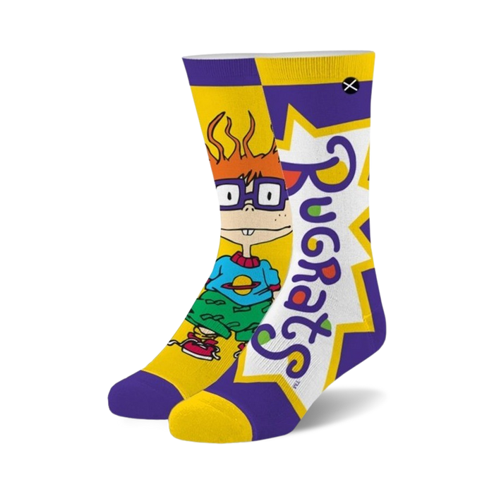 purple and yellow crew socks with chuckie from rugrats wearing green pants, yellow shirt, glasses, and red sneakers.   }}