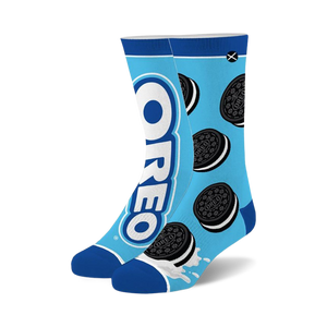 Pair of blue crew socks with Oreo cookies and logo design. Features white and black Oreo cookies on a light blue background.