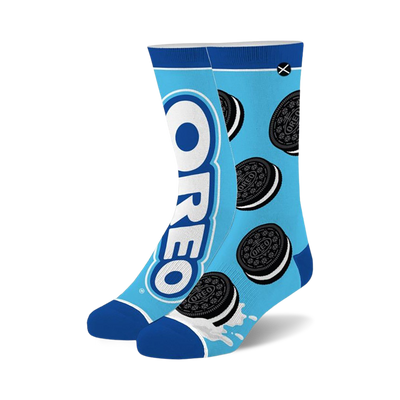 Pair of blue crew socks with Oreo cookies and logo design. Features white and black Oreo cookies on a light blue background.