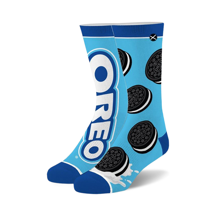 Pair of blue crew socks with Oreo cookies and logo design. Features white and black Oreo cookies on a light blue background.