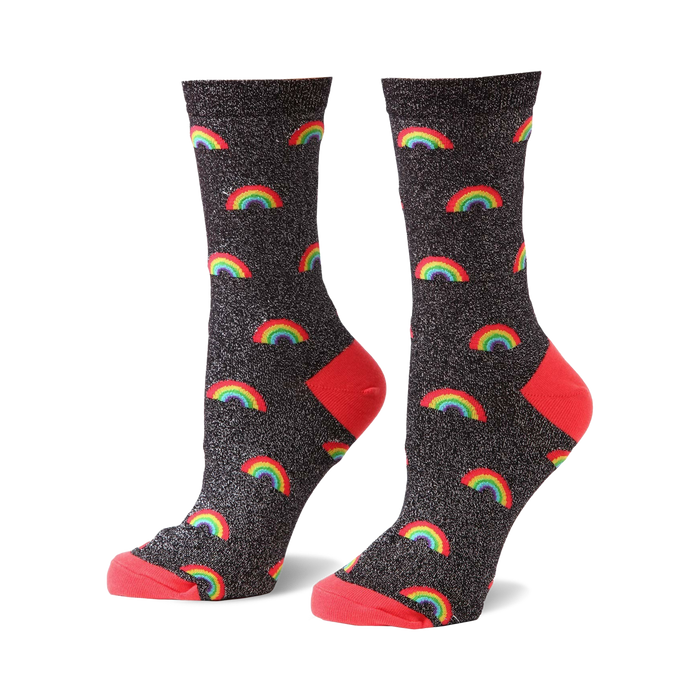 Crew socks in black glitter with multicolored rainbow pattern and coral heel and toe. }}
