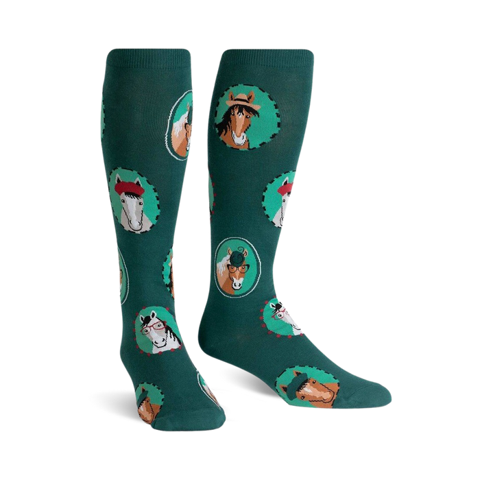 Pair of teal knee-high socks with a repeating pattern of horses wearing hats and glasses in circular frames.