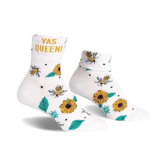 Pair of white ankle socks with a 'Yas Queen!' slogan, buzzing bees, and sunflowers.  Cute and comfy!