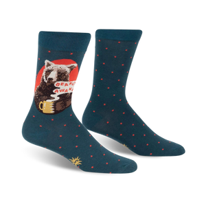 Pair of teal crew socks with a design of a bear drinking coffee.  Red and orange accents and small teal dots are also featured.