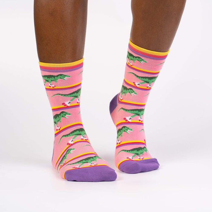 Lifestyle shot of Rawr-ler Rink socks on a person's legs, showcasing the socks' fit and pattern.