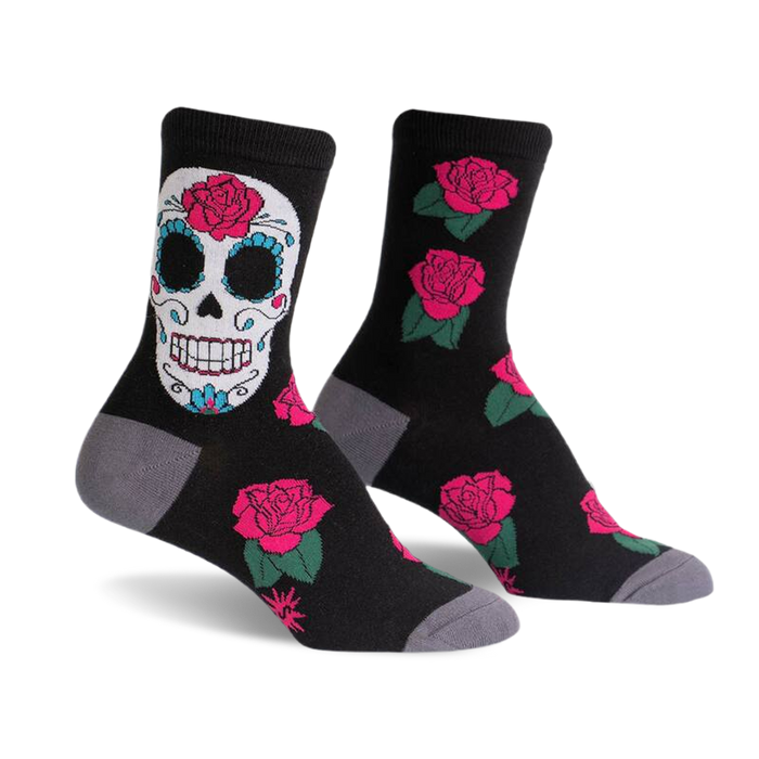 Black crew socks with a colorful sugar skull and pink roses. Grey cuffs add a subtle contrast.