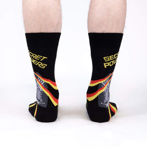 Rear view of a person wearing the 'Secret Powers' socks.  The cat and stripes are partially visible.
