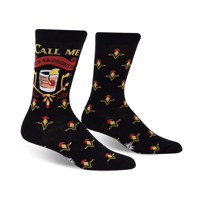 Black crew socks with an Old Fashioned cocktail graphic and 'Call Me Old Fashioned' text. Red, gold, and yellow details on a black background.