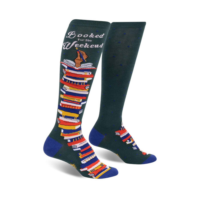 green knee-high socks with a pattern of small blue polka dots, features a stack of books design, and the words 'booked for the weekend' on the top cuff.  