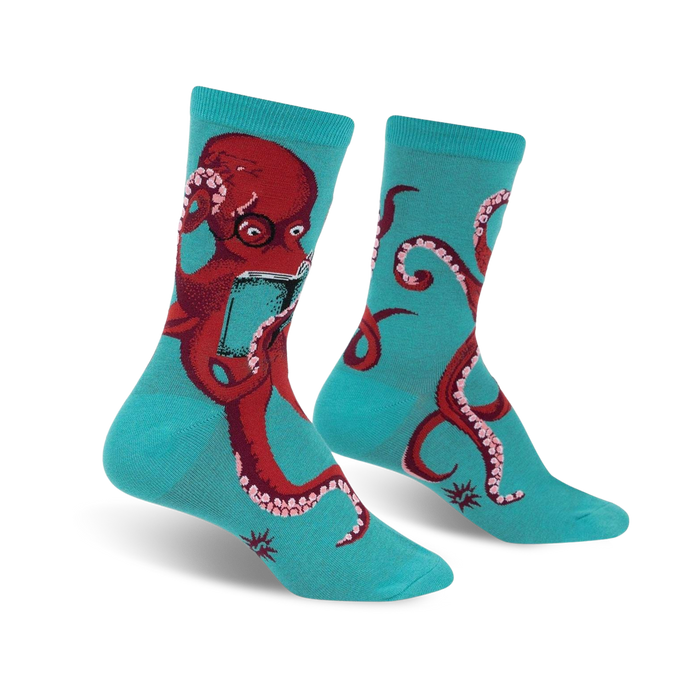 Crew socks in teal featuring a red octopus reading a book.  Fun, quirky design with whimsical details.