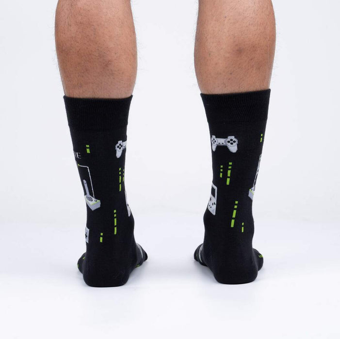 Rear view of the 'Game On' socks on a person's legs, showing the full design from behind.