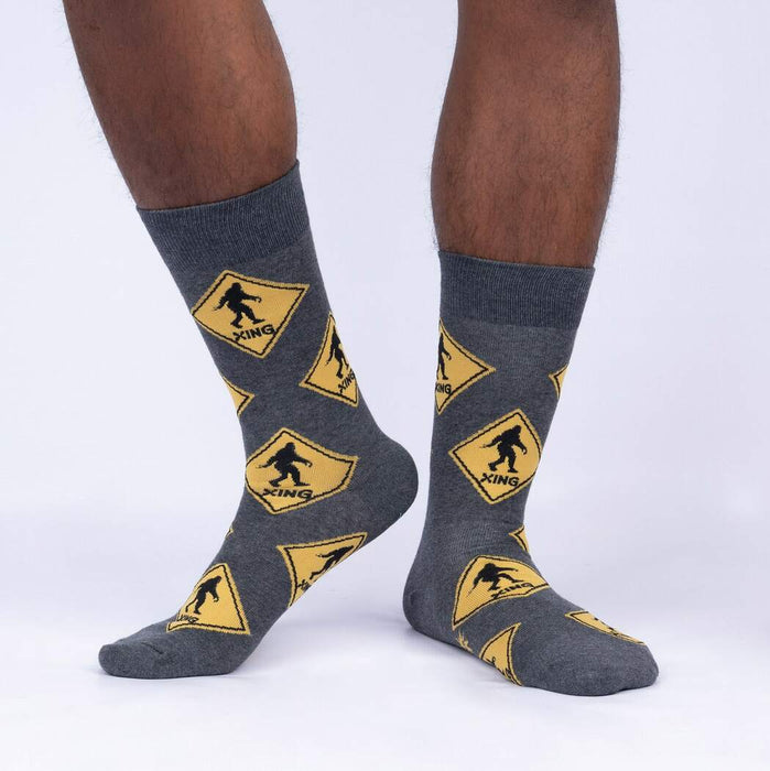 Lifestyle shot of a person wearing the Bigfoot Xing socks, showing how they look on the foot.