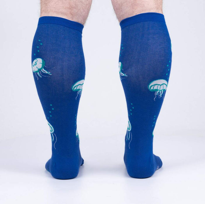 Rear view of 'Nice to Sea You' socks on a model, highlighting the full jellyfish print on the back.
