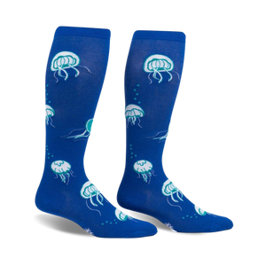 Pair of blue knee-high socks with a whimsical jellyfish pattern.  Features teal accents and glows in the dark!