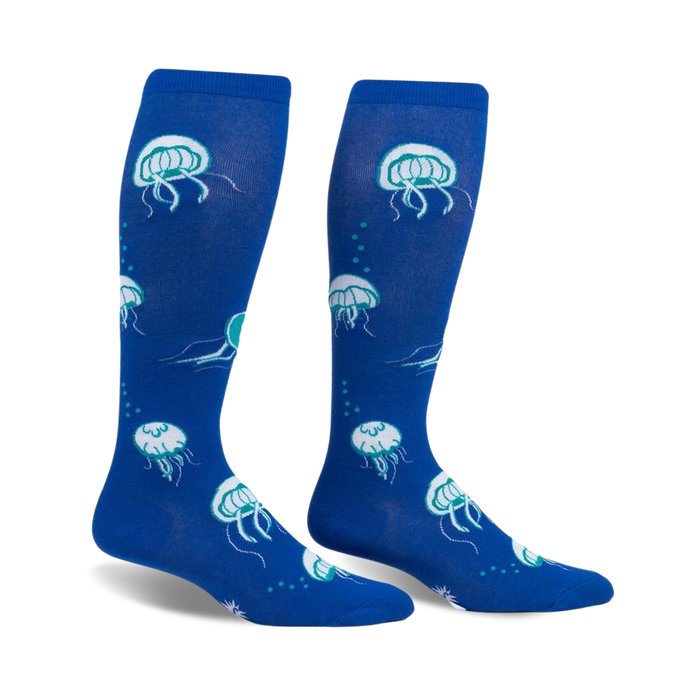 Pair of blue knee-high socks with a whimsical jellyfish pattern.  Features teal accents and glows in the dark!