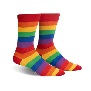 crew length rainbow socks symbolize support for the lgbtq+ community. perfect for pride events or everyday wear.  