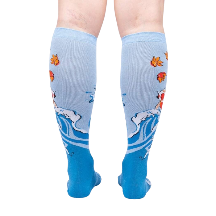 Rear view of a pair of 'Beauty in Water' knee-high socks, highlighting the full design detail on the back of the socks.